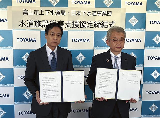 協定を結んだ黒田理事長（左）と前田管理者